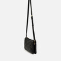 Florchito bolso bandolera pequeño con detalles metálicos 