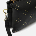 Florchito bolso bandolera pequeño con detalles metálicos 