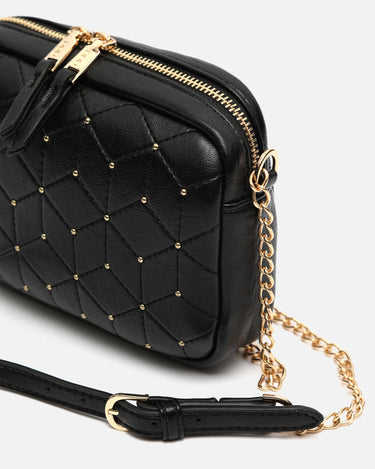 Reko bolso bandolera mini con detalles metálicos 