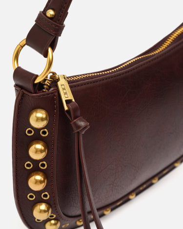 Maden bolso de hombro pequeño con detalles metálicos 