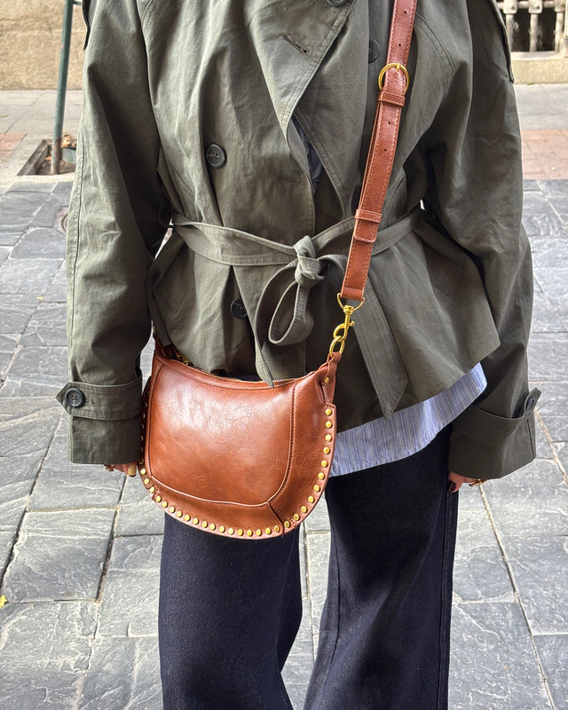 Beulito bolso bandolera pequeño con detalles metálicos