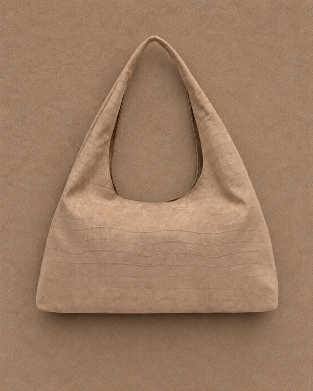 Schets van grote hobo tas in suède-effect met dierenprint embossing