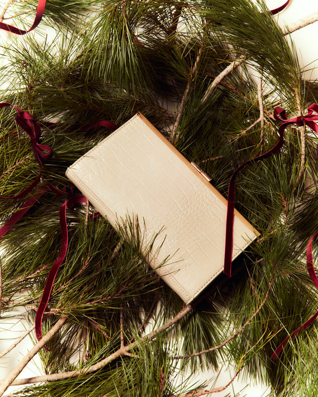 Imelda bolso de fiesta pequeño con correa y estampado animal print