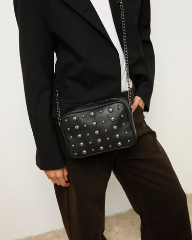 Banteri bolso bandolera pequeño con tachuelas 
